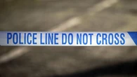 Man arrested on suspicion of murder and robbery after death of 87-year-old
