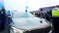 Car carrying Delia Smith hit with beer can as it arrives for football derby