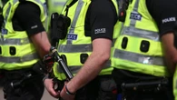 Man and woman charged over Dundee girl weapon incident