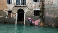 Bansky work The Migrant Child removed from Venetian palazzo for restoration