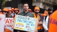 NHS doctors go on strike as leaders warn industrial action could mean staff cuts