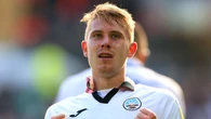 Ollie Cooper’s first Wigan goal earns point at Mansfield