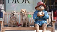 Vandalised Paddington Bear statue returns to town after being repaired