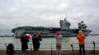 HMS Prince of Wales returns to port after hosting the King at sea