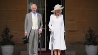 King meets social influencer teacher dubbed the ‘pied piper’ at garden party