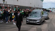 Fans applaud as Sir Tom Farmer’s hearse passes Easter Road