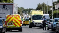 Teacher tells inquiry of hiding with child in toilet as attacker banged on door