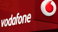 Vodafone swings to loss but says German arm will return to growth this year
