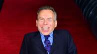 Warwick Davis dedicates Bafta Fellowship award to those who have supported him