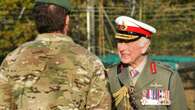 King returns to Royal Marines training base to meet recruits