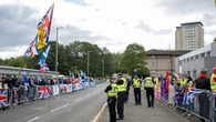 Protest and counter-demonstration take place outside asylum seeker hotel