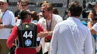Harry Kane greets Lewis Hamilton as England players take in Spanish Grand Prix