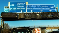 M25 partially closed after waste lorry overturns in collision