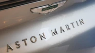 Aston Martin cuts investment plans as sales tumble further