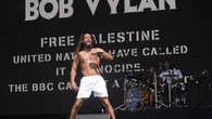 Glastonbury says chants by Bob Vylan ‘crossed the line’ as police assess footage