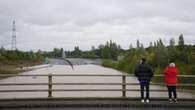 Commuters face road closures and disrupted rail services following flooding