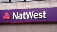 Protesters halt NatWest shareholder meeting as boss defends climate policy