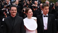 Emma Stone and Pedro Pascal pose on Cannes red carpet for Eddington premiere