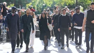 Sean ‘Diddy’ Combs gives a thumbs up to spectators at racketeering trial
