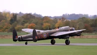 UK’s last flying Lancaster bomber touches down for maintenance work
