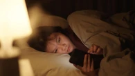 What age can you leave a child alone overnight in the school summer holidays?
