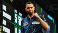 Luke Humphries hits nine-darter to beat Michael Smith at Grand Slam of Darts