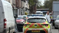 Woman arrested after two boys killed in house fire released on bail