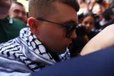 What punishment could Kneecap rapper face for alleged terror offence?