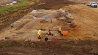 Ancient chariot wheel and cremation urn found at site of new golf course