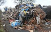 Company boss denies dumping 80ft mound of rubbish on country lane