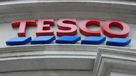 Tesco lifts profit outlook after lowered prices boosts trading