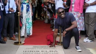 Idris Elba unveils Mobo paving stone at college where he ‘got to dream bigger’