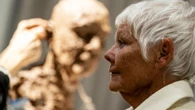 Sculptor produces bust of Dame Judi Dench in front of audience for charity