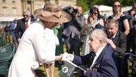 Veteran, 102, recalls war stories as he joins comrades at royal garden party