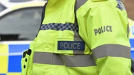 Six arrested after protest outside Manchester hotel