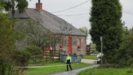 Man due in court charged over deaths of couple and their son