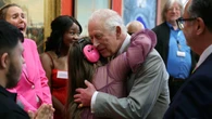 Teenager Florence surprises Charles with ‘awesome’ hug