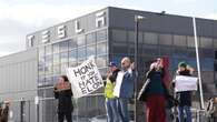 Protesters gathered outside Tesla dealership call for boycott