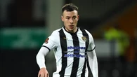 Scunthorpe close in on leaders after victory against bottom club Morecambe
