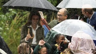 Kate debuts blonde look as she leads schoolchildren out of rainstorm