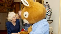 Queen meets Peter Rabbit as she wishes reading charity ‘happy 100th birthday’