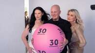 Lottery winners snapped by celebrity photographer for 30th anniversary