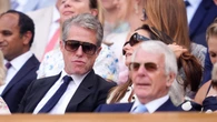 Hugh Grant and the Queen among famous faces in crowd during day 10 of Wimbledon