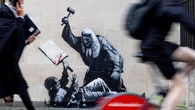 Concealed Banksy artwork shows judge beating unarmed protester