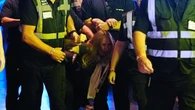Climate protesters removed from Reform conference after heckling Nigel Farage