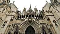 Migrants lose late-night High Court bids to block removal to France