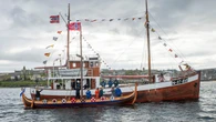 ‘Shetland Bus’ convoy greeted with floating salute as it arrives in Lerwick