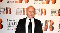 Anthony Hopkins channels Hannibal Lecter while wearing Skims face wrap