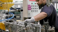 UK business activity improves as manufacturing returns to growth