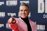 Robbie Williams' battle with the incredibly dark side of fame